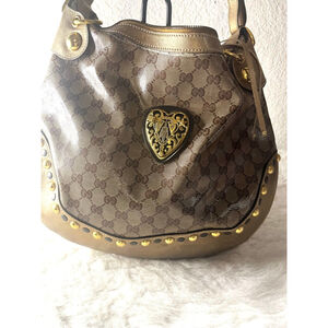 Gucci GG Signature and Studded Metallic Leather Babouska Hobo Bag.